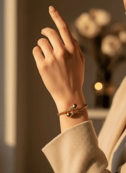 21k gold-plated twisted cable cuff bracelet with zirconia balls