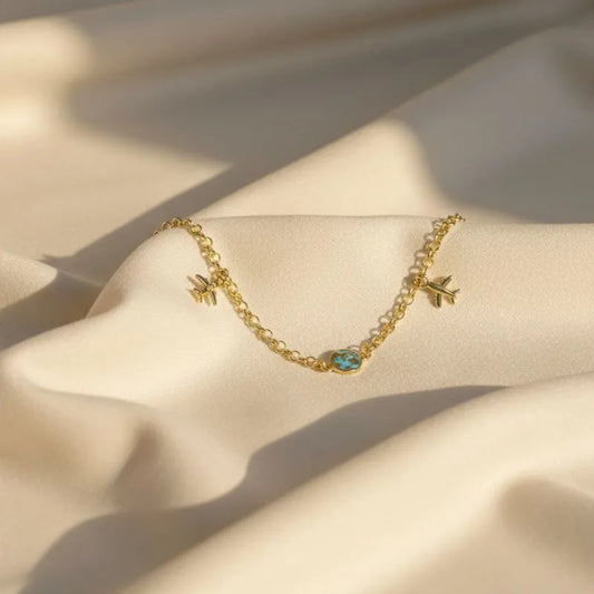 Gold-Plated Charm Bracelet with Travel-Themed Charms
