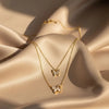 Gold-plated layered necklace with butterfly pendants