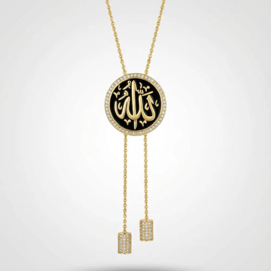 Gold necklace with a black pendant featuring Arabic calligraphy on a white background