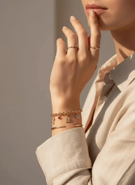 Stunning gold-plated bracelet with a lock, key, and crystal design