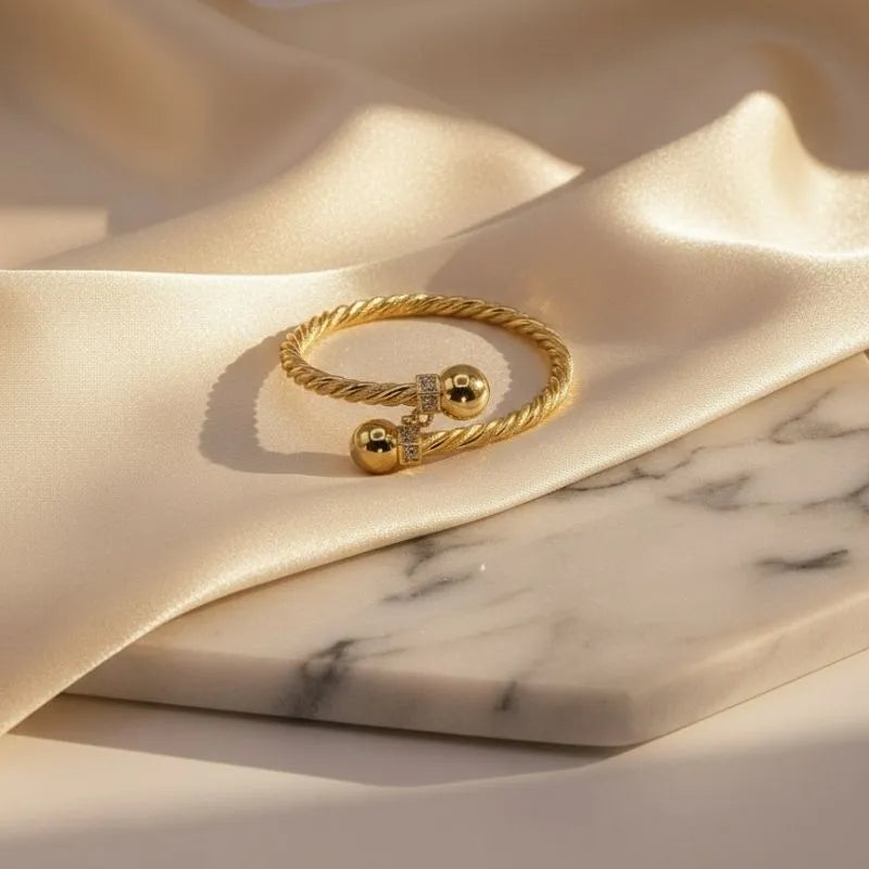 21k gold-plated twisted cable cuff bracelet with zirconia balls