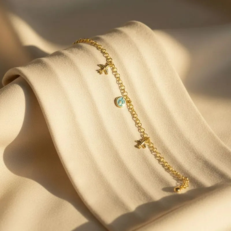 Gold-Plated Charm Bracelet with Travel-Themed Charms