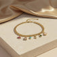 Gold-Tone Multi Charm Collar Necklace With bracelet