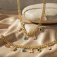 Gold-Tone Multi Charm Collar Necklace With bracelet