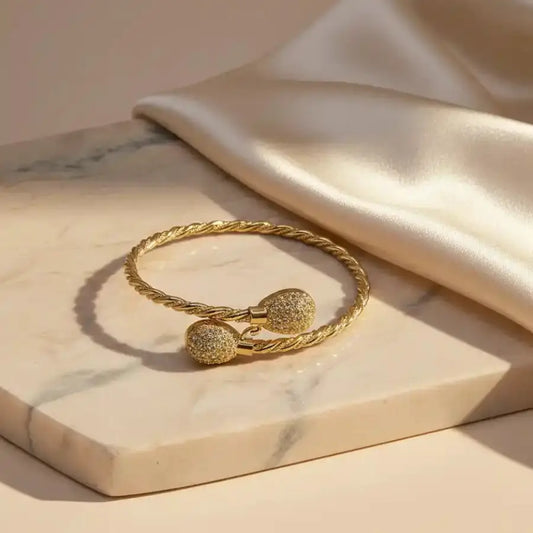 Gold-plated 21k twisted cable cuff bracelet