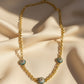Gold-plated chain necklace with three turquoise evil eye charms