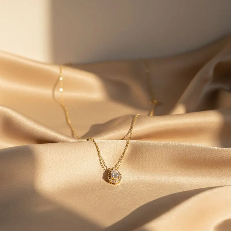 Gold-plated pear-shaped diamond halo pendant necklace