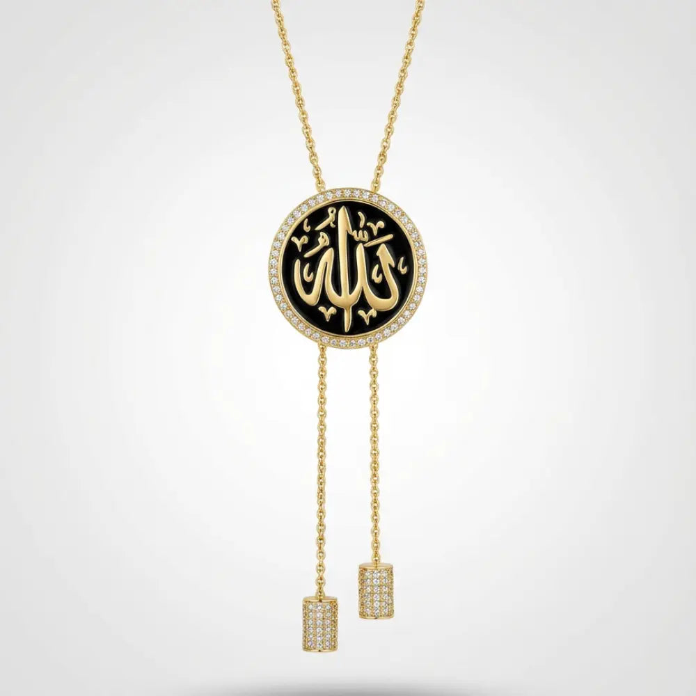 Gold necklace with a black pendant featuring Arabic calligraphy on a white background