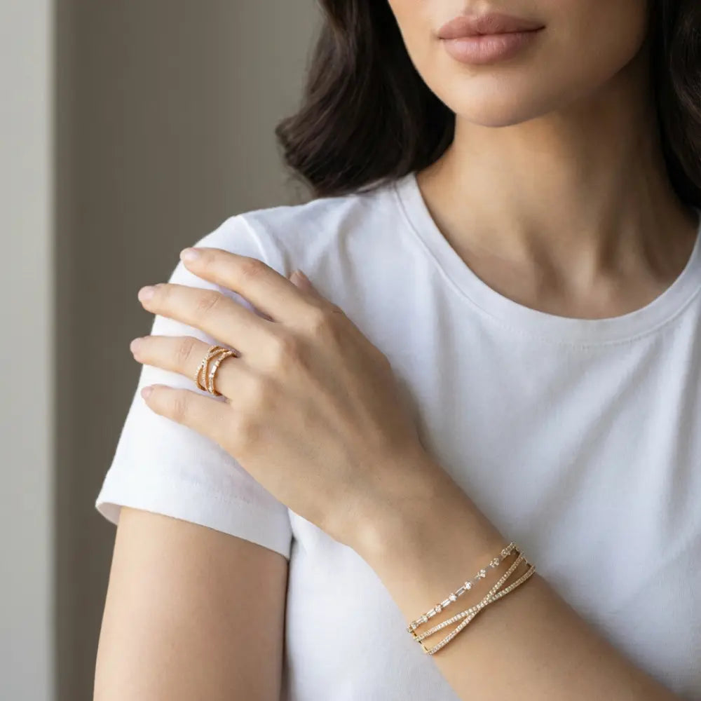 Woman wearing Gold Plated Criss-Cross Baguette Bracelet and Ring Set