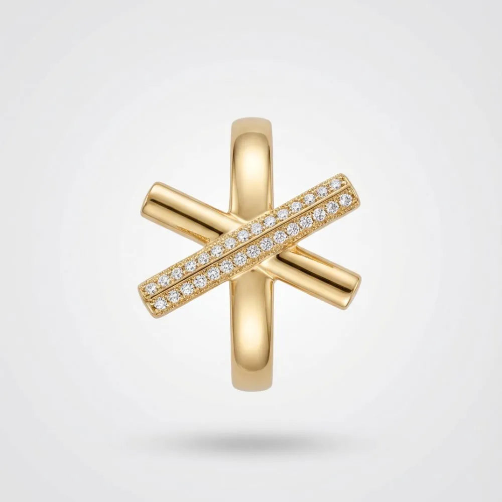 Gold cross-shaped pendant with embedded diamonds on a light gray background