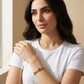 Woman wearing a Gold Plated hinged bangle Baguette Gemstone