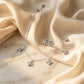 Elegant Silver Butterfly Necklace and matching Stud Earrings set adorned with shimmering stones.