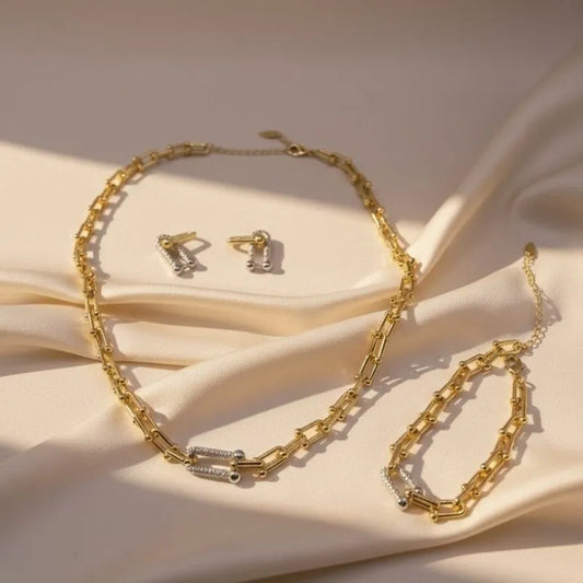 Tiffany set gold-plated and silver with zircon