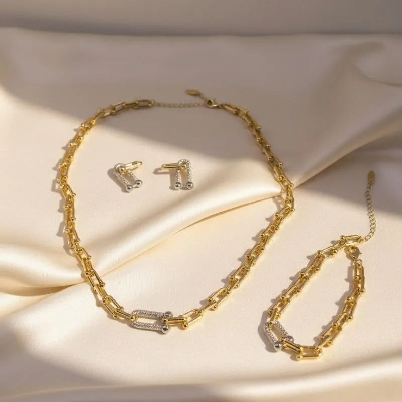 Tiffany set gold-plated and silver with zircon