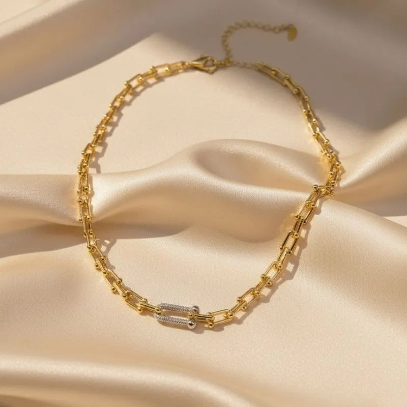 Tiffany set gold-plated and silver with zircon