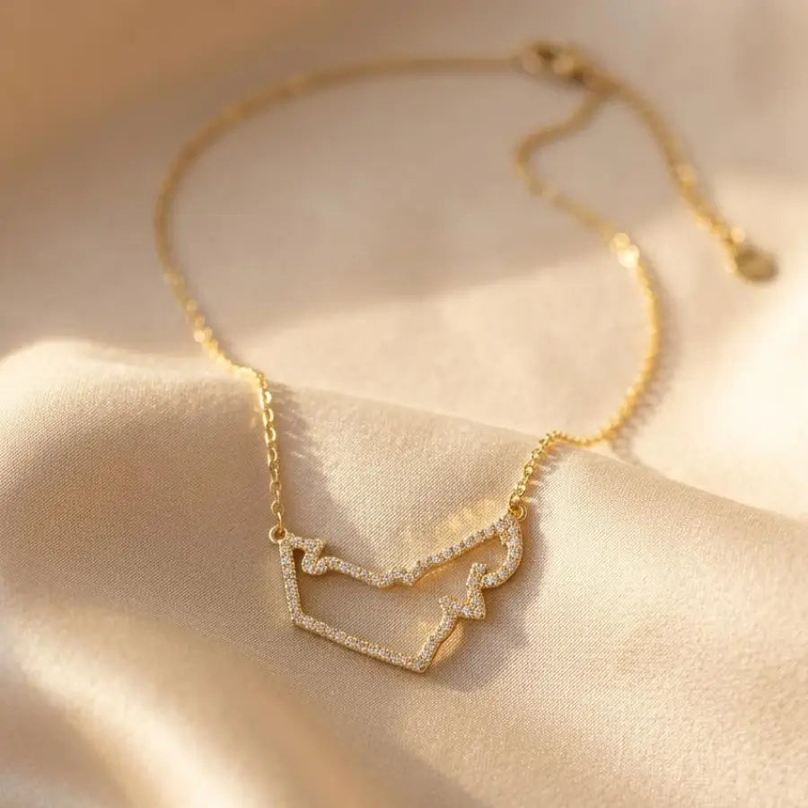 Gold-Plated UAE Map Pendant Necklace with Shimmering Zirconia