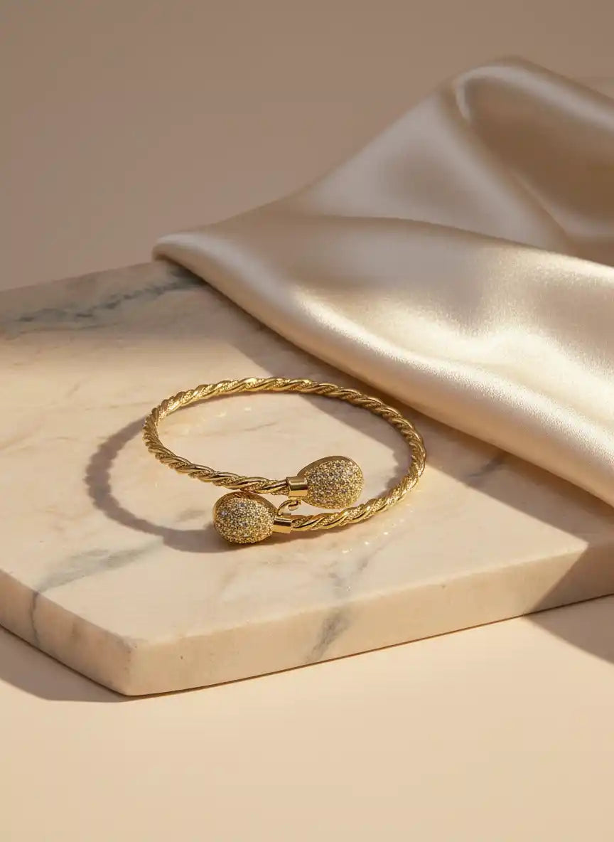Gold-plated 21k twisted cable cuff bracelet