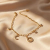 gold-plated non-tarnish star and moon charm bracelet