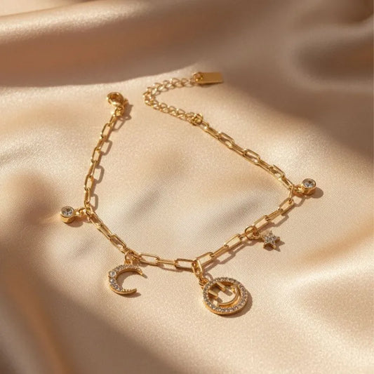gold-plated non-tarnish star and moon charm bracelet