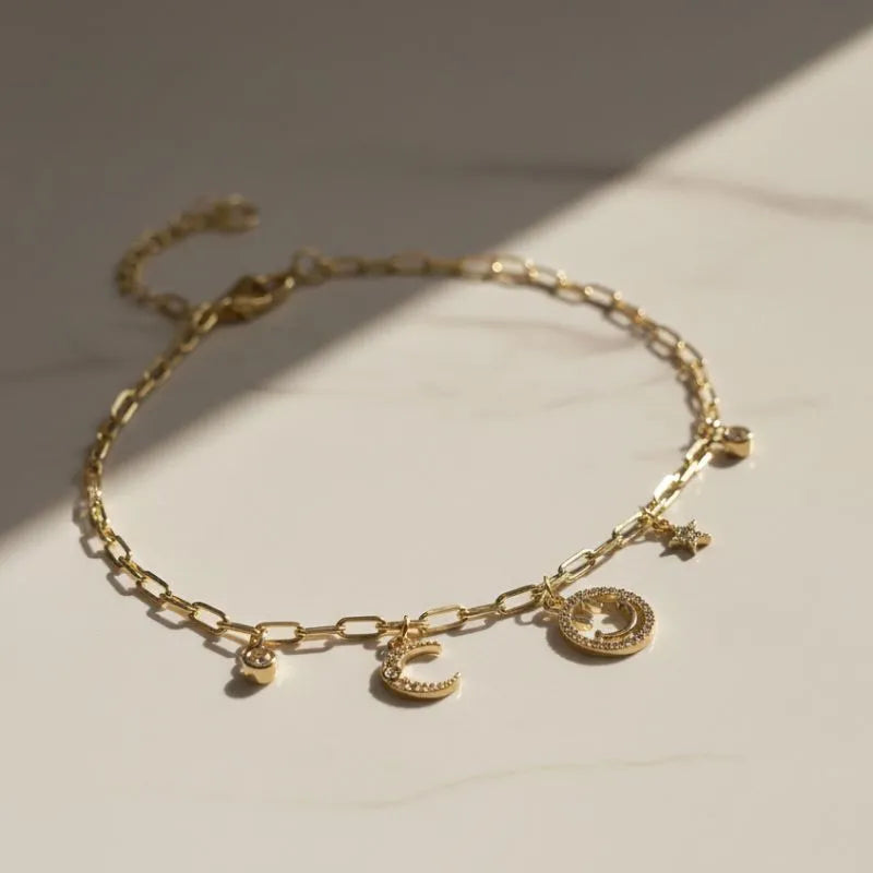 gold-plated non-tarnish star and moon charm bracelet