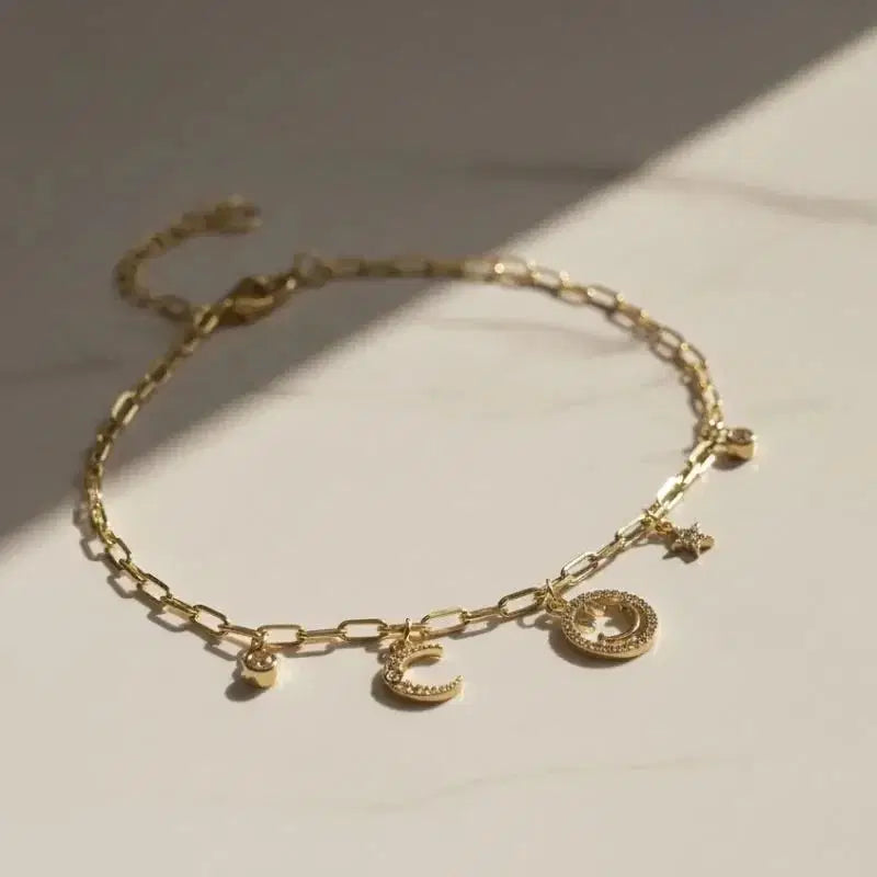 gold-plated non-tarnish star and moon charm bracelet