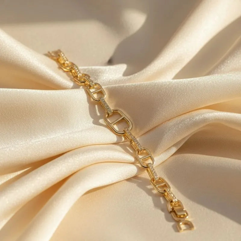 gold-tone chain link bracelet with pavé crystal accents